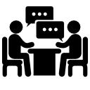 Men couple sitting on a table talking about business
